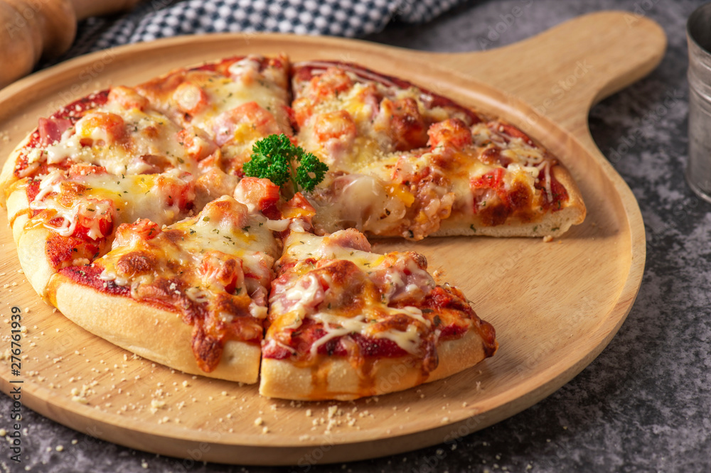 Slice of pizza cheese crust seafood topping sauce. with bell pepper vegetables delicious tasty fast food italian traditional