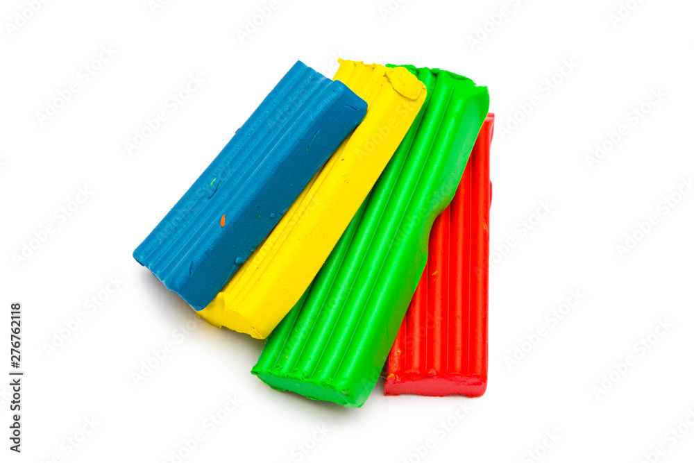 Multi-colored plasticine isolated on white Multi-colored plasticine isolated on white