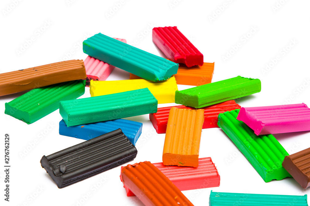Multi-colored plasticine isolated on white Multi-colored plasticine isolated on white