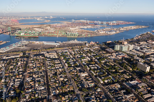 Afternoon aerial view of San Pedro area streets, homes and harbor waterfront facilities in Los Angeles County California.   photo