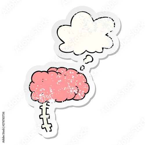 cartoon brain and thought bubble as a distressed worn sticker