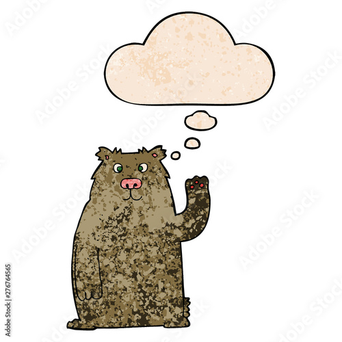 cartoon bear and thought bubble in grunge texture pattern style