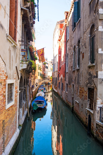 View of the canal, old houses and bridge in Venice, Italy