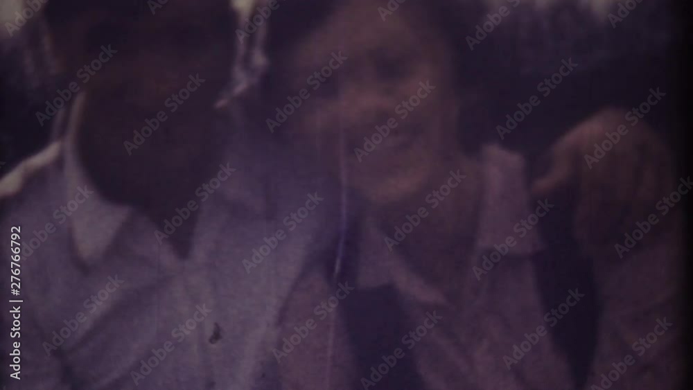Family chronicle, memories: Happy young loving couple. My love parents. My beauty family. Shot on 8 mm retro camera.