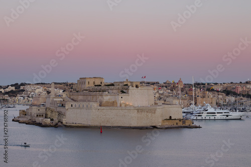 Fort St. Angelo at sunset with the Grand Harbor in Vittoriosa during sunset, Malta.