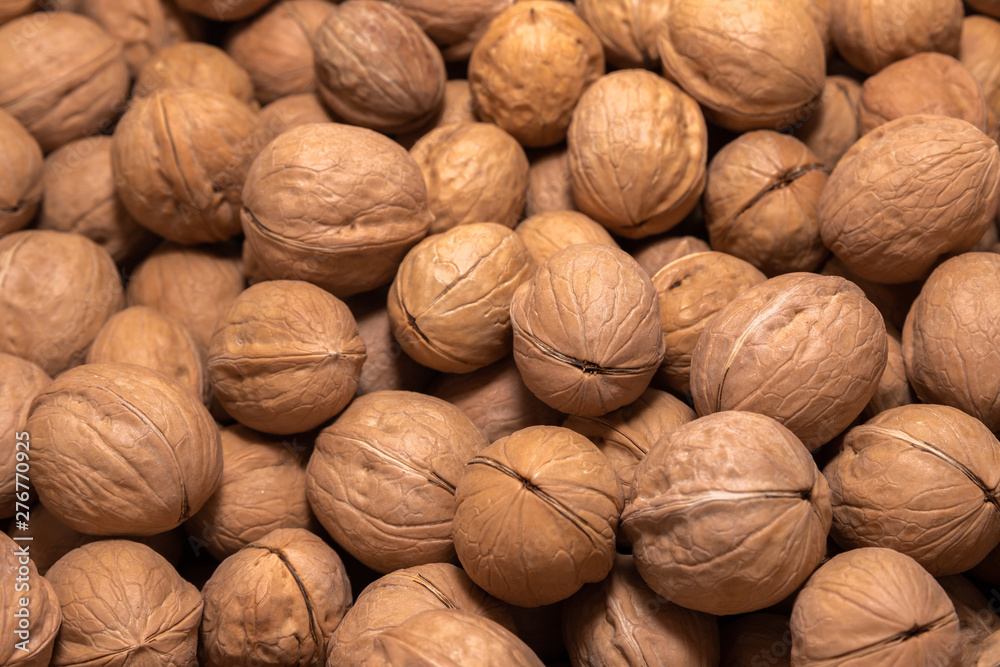 Background for wallpaper in the form of a pattern of walnuts. Background for wallpaper in the form of a pattern of walnuts.