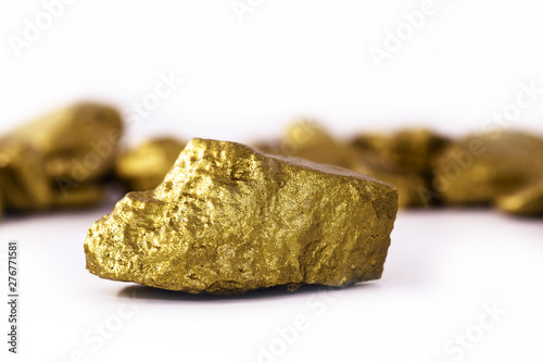 Gold stone in high resolution. Gold on white background isolated. Mineral extraction concept.