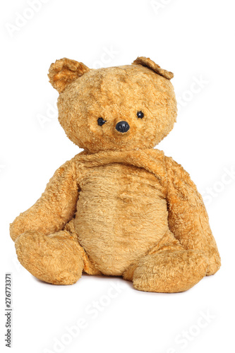Old teddy bear on white background