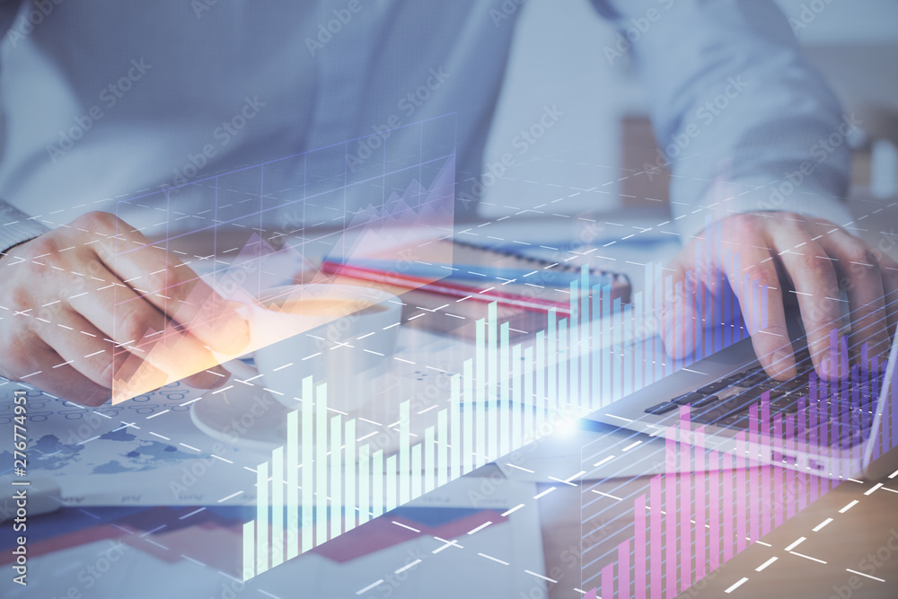 Forex graph with businessman working on computer in office on background. Concept of hardworking. Double exposure. Forex graph with businessman working on computer in office on background. Concept of hardworking. Double exposure.