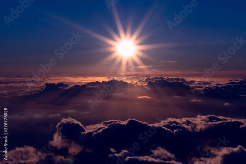 sunset above clouds