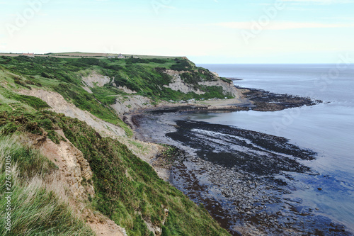 Port Mulgrave bay and jetty, North Yorkshire, UK. Viewed from the Cleveland Way walk from Runswick Bay to Staithes.