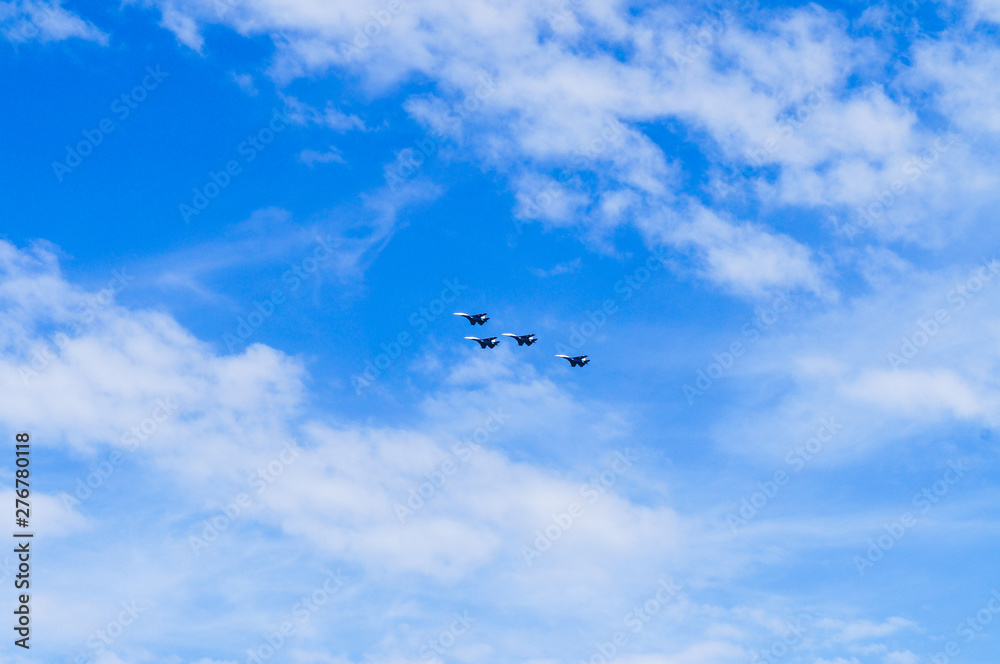 group of planes in the blue sky