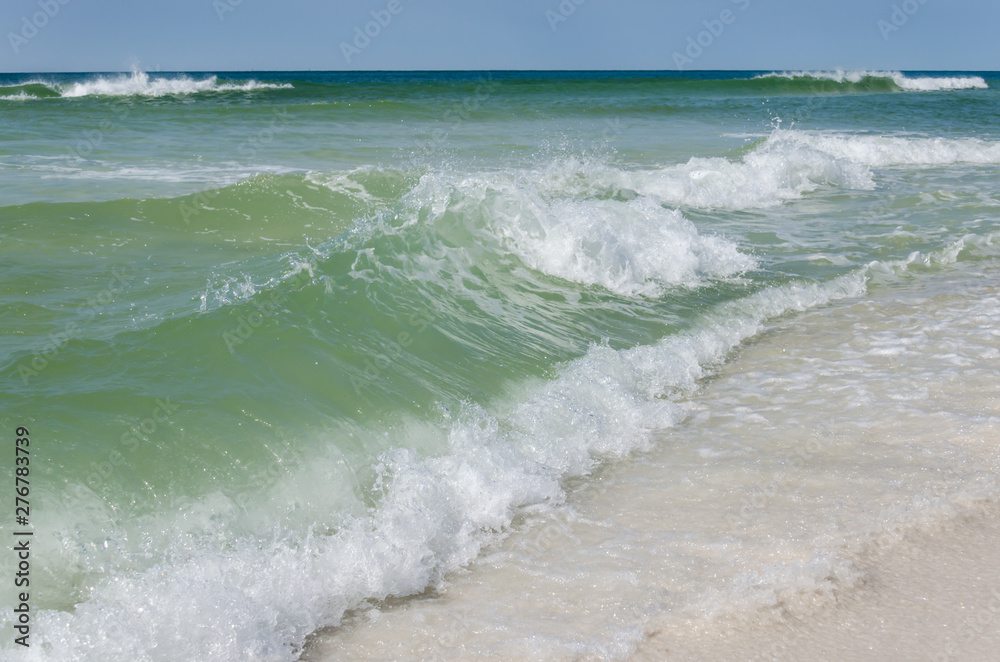 Tropical ocean beach landscape scene. Beautiful scenic tourist travel destination location. Relaxing Gulf Coast seaside beaches.