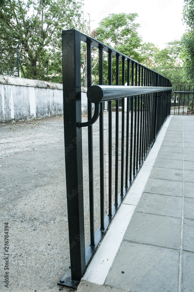 Protection railing for access ramp to a building in black color Protection railing for access ramp to a building in black color