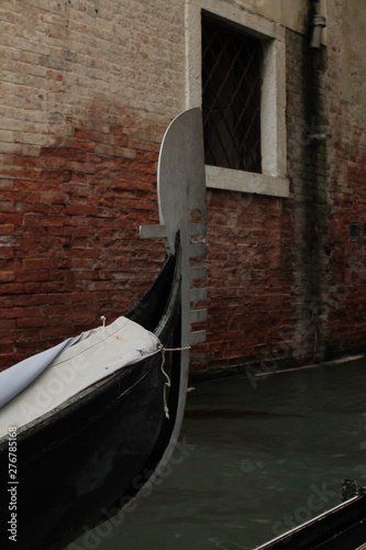 Tip of a gondola in Venice Italy