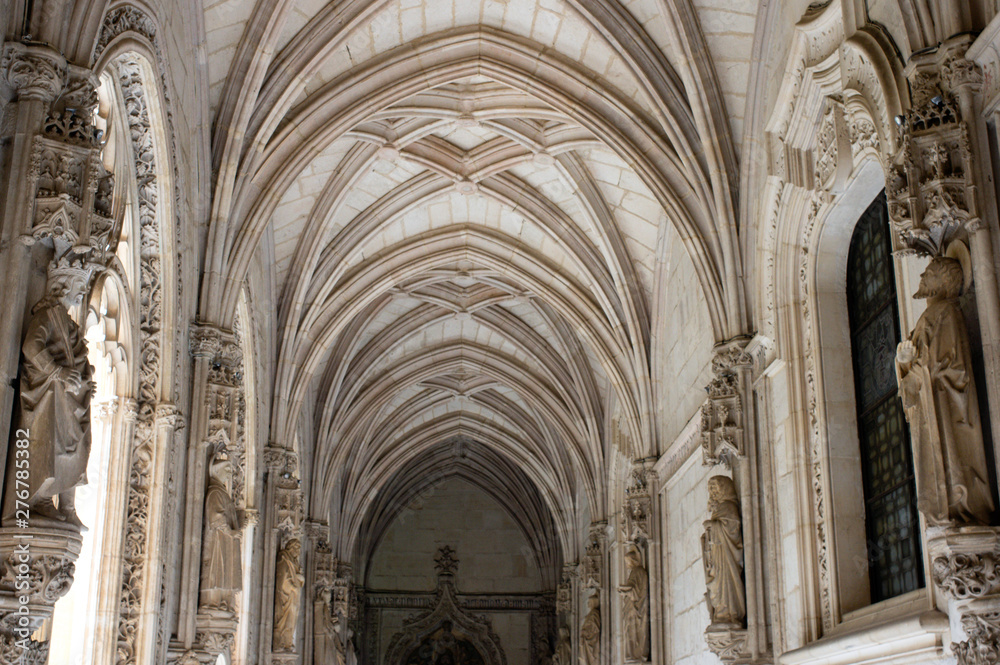 Toledo / Spain - April 30 / 2019 : corridors with sculptures of monasterio san juan de los reyes