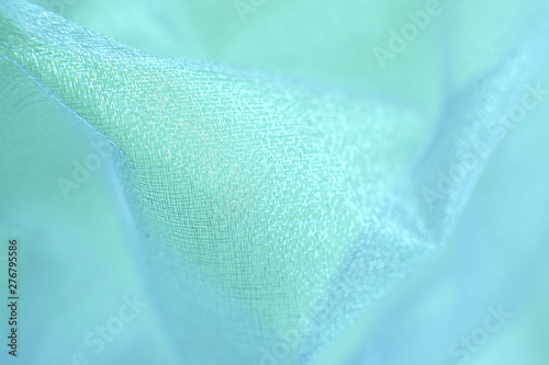Abstract neo mint soft chiffon texture background. Macro with extremely shallow dof. photo