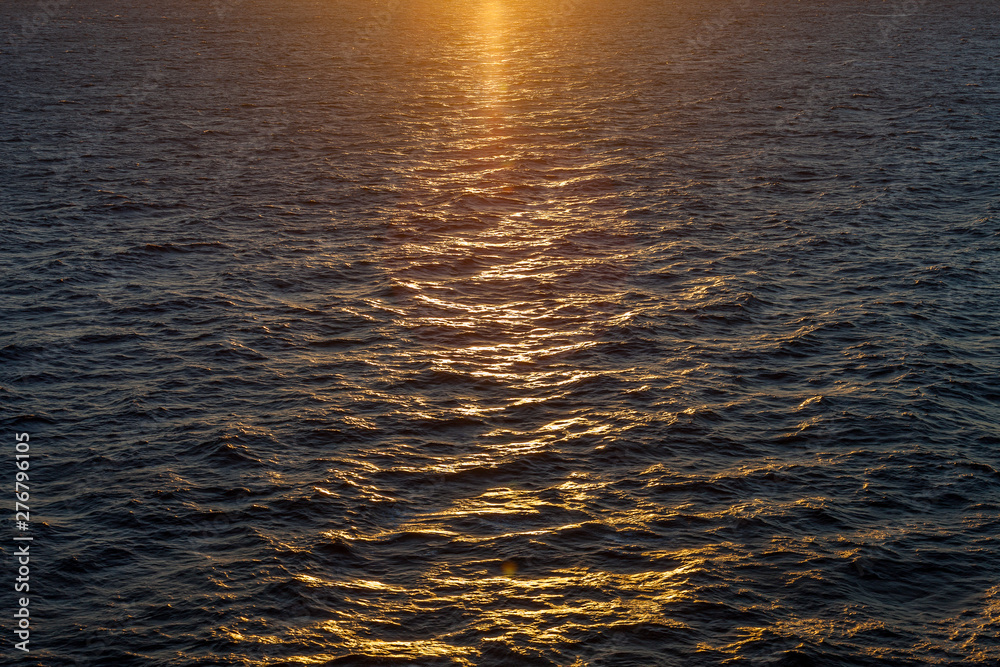 Beautiful reflections on the waves of the Mediterranean sea at sunset Beautiful reflections on the waves of the Mediterranean sea at sunset