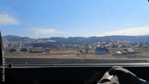 View from a car window of a typical Romainian landscape photo