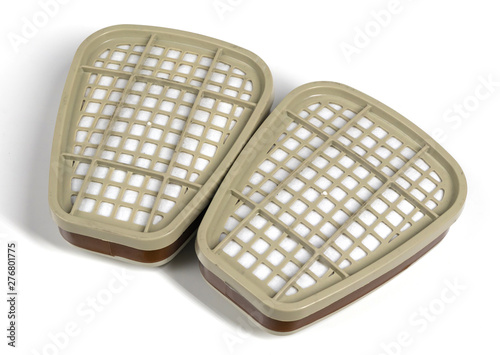 Replaceable cartridges for half-mask and full-face mask respirators, isolated on white background.