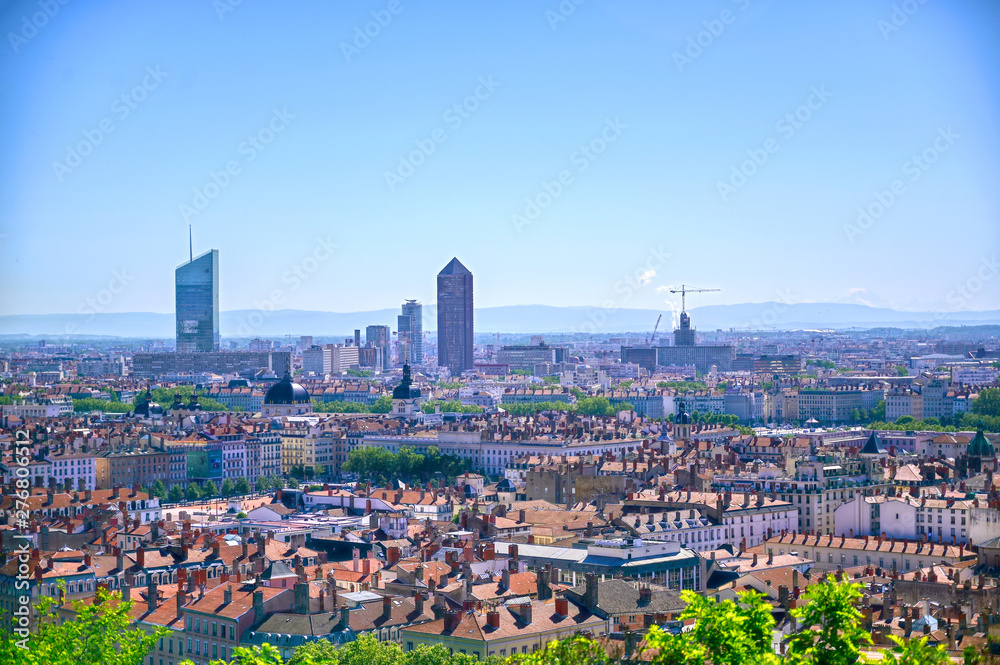 Fototapeta premium An aerial view of Lyon, France and the Saone River during morning hours.
