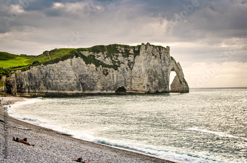 Etretat, France - June 29, 2012. Coastline of English Channel in Normandy with nature arches photo