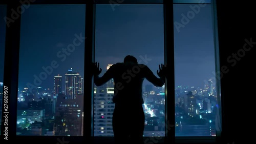 silhouette of upset businessman photo