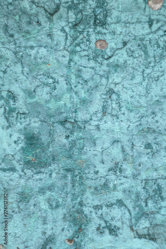 bright textured concrete wall turquoise