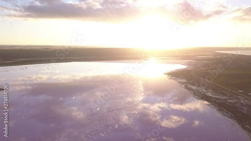 Aerial view of the Pink Lake in south west Australia. The pink lake reflects the red Australian desert sun in its clear water