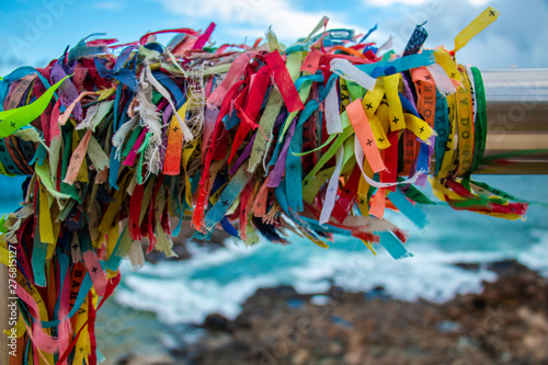 Slippers of "Senhor do Bonfim", rolled up in mast. It is believed that it can meet desires.