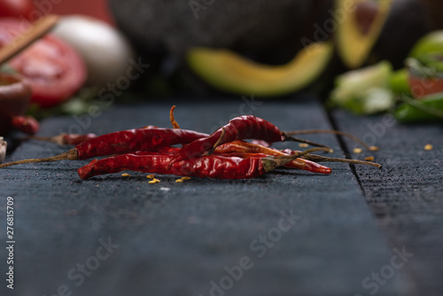 Chile de Arbol y Molcajete con Ingredientes de verduras y especias para Tacos photo