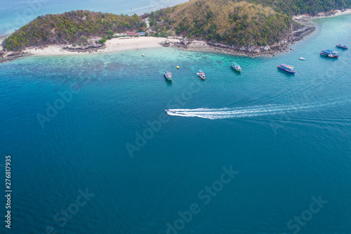 Aerial top view. Marine tour boat in the sea in island. summer beach and sea travel concept. Island public place. for advertising travel.