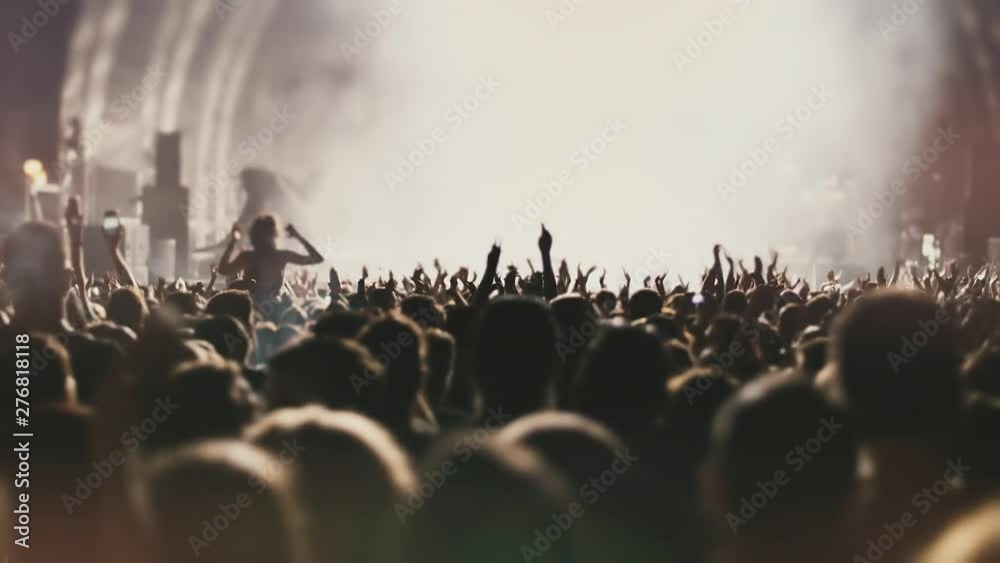 Night Rock Concert Front Row Crowd Cheering in slow motion.Epic party ...