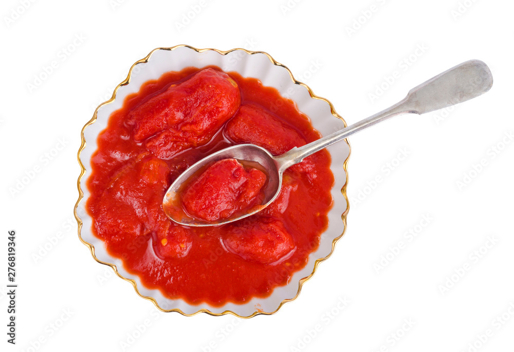 Φωτογραφία White plate with ripe red tomatoes in own juice. Studio Photo