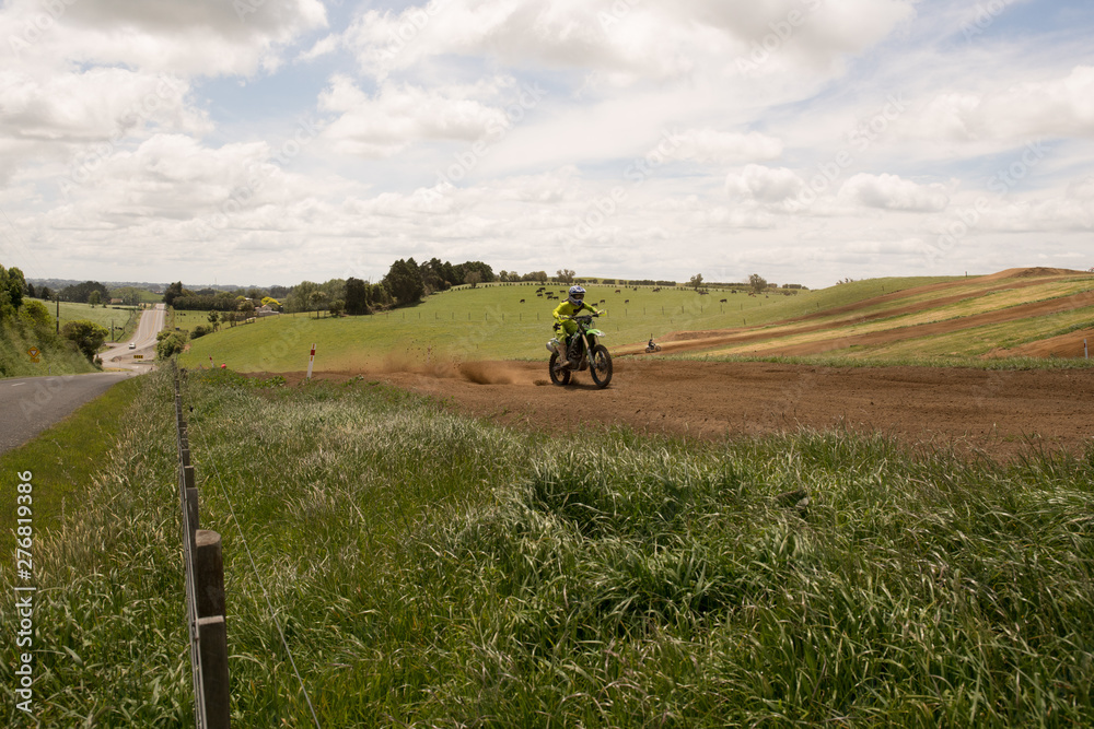 Obraz premium Moto Cross racing on a rural farm