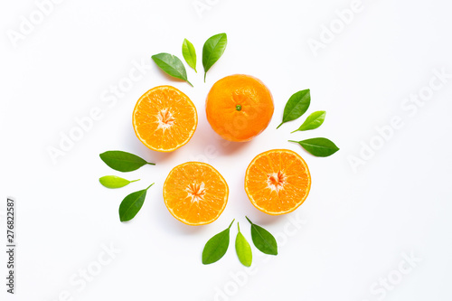 Fresh orange citrus fruit with leaves on white background. Juicy, sweet and high vitamin C