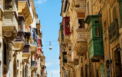 ancient old houses around narrow street in Mediterranean island Malta