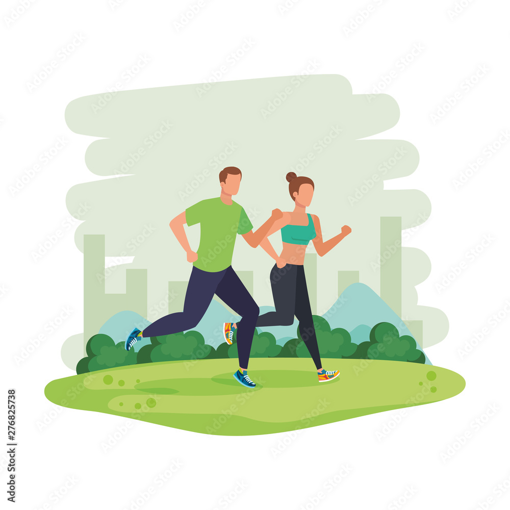 young athletic couple running in the park