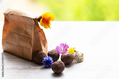 seed balls or seed bombs with various blossoms photo