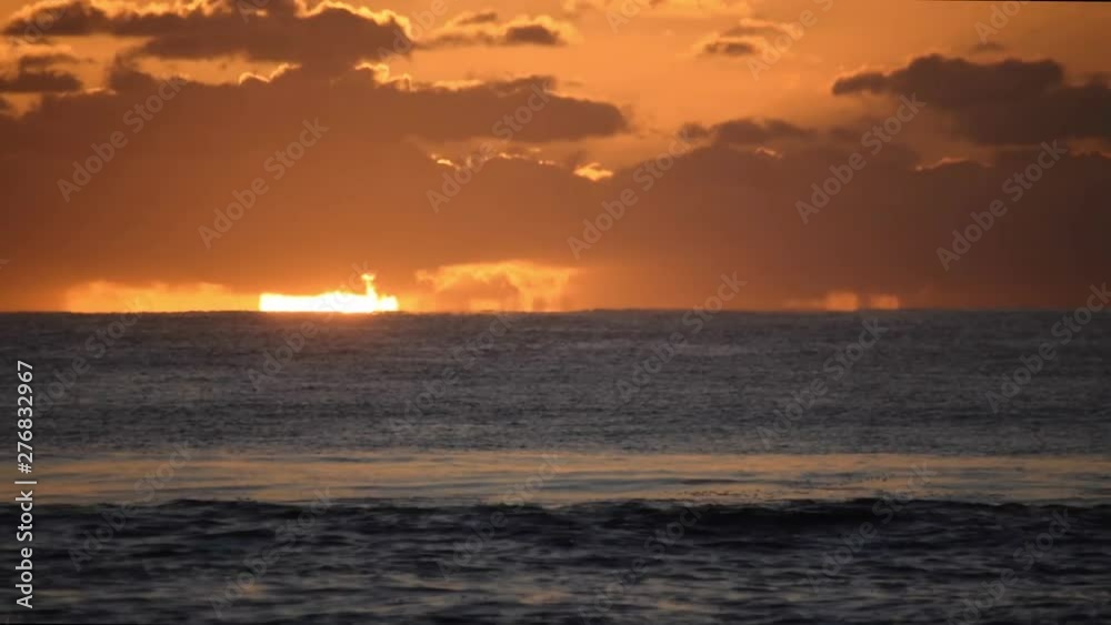 Long Shot of Golden sunrise on the open ocean Long Shot of Golden sunrise on the open ocean