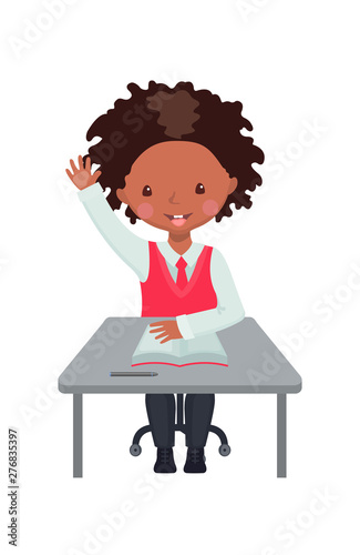 African American boy raising hand for an answer.