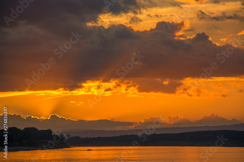 Scenic View Of Lake Against Sky During Sunset © Sitthipong