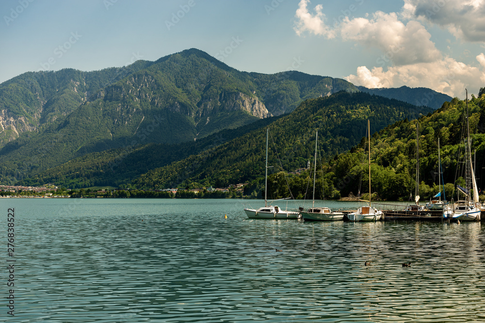 Sailboats in the Caldonazzo lake, Italian Alps, Valsugana valley, Trento province, Trentino Alto Adige, Italy, Europe Sailboats in the Caldonazzo lake, Italian Alps, Valsugana valley, Trento province, Trentino Alto Adige, Italy, Europe