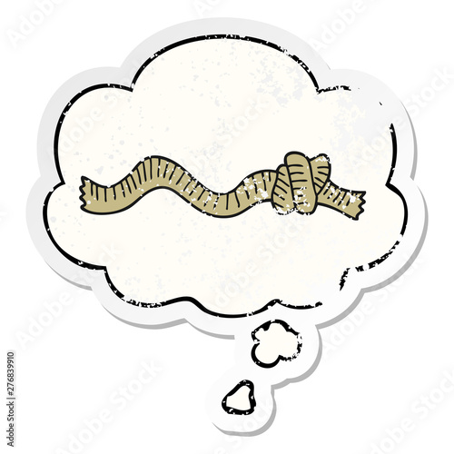 cartoon knotted rope and thought bubble as a distressed worn sticker
