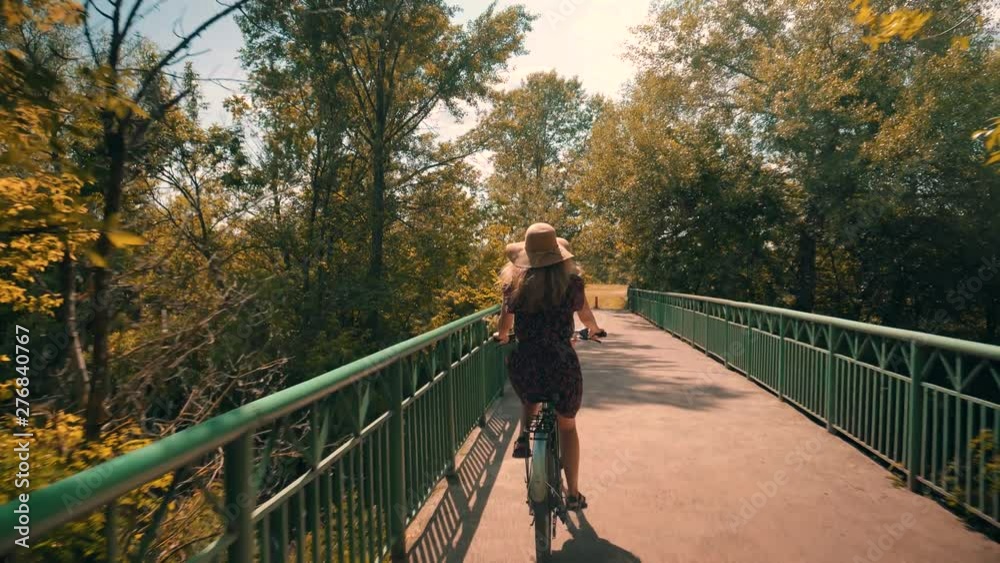 Cyclist Woman Cycling On Bicycle.Girl Cycling On Bike.Cyclist Beautiful Woman Wearing Dress Rides Bicycle.Happy Woman In Hat Riding On Bicycle.Pretty Girl On Bicycle.Woman With Blonde Hair Cycling Cyclist Woman Cycling On Bicycle.Girl Cycling On Bike.Cyclist Beautiful Woman Wearing Dress Rides Bicycle.Happy Woman In Hat Riding On Bicycle.Pretty Girl On Bicycle.Woman With Blonde Hair Cycling