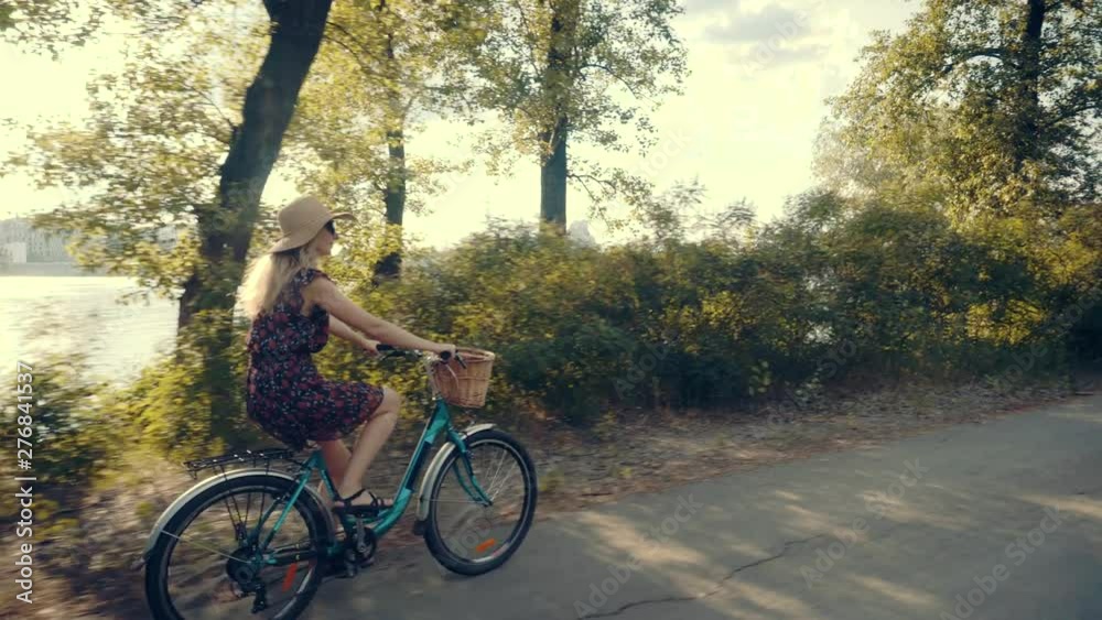 Cyclist Woman Cycling On Bicycle.Girl Cycling On Bike.Cyclist Beautiful Woman Wearing Dress Rides Bicycle.Happy Woman In Hat Riding On Bicycle.Pretty Girl On Bicycle.Woman With Blonde Hair Cycling Cyclist Woman Cycling On Bicycle.Girl Cycling On Bike.Cyclist Beautiful Woman Wearing Dress Rides Bicycle.Happy Woman In Hat Riding On Bicycle.Pretty Girl On Bicycle.Woman With Blonde Hair Cycling