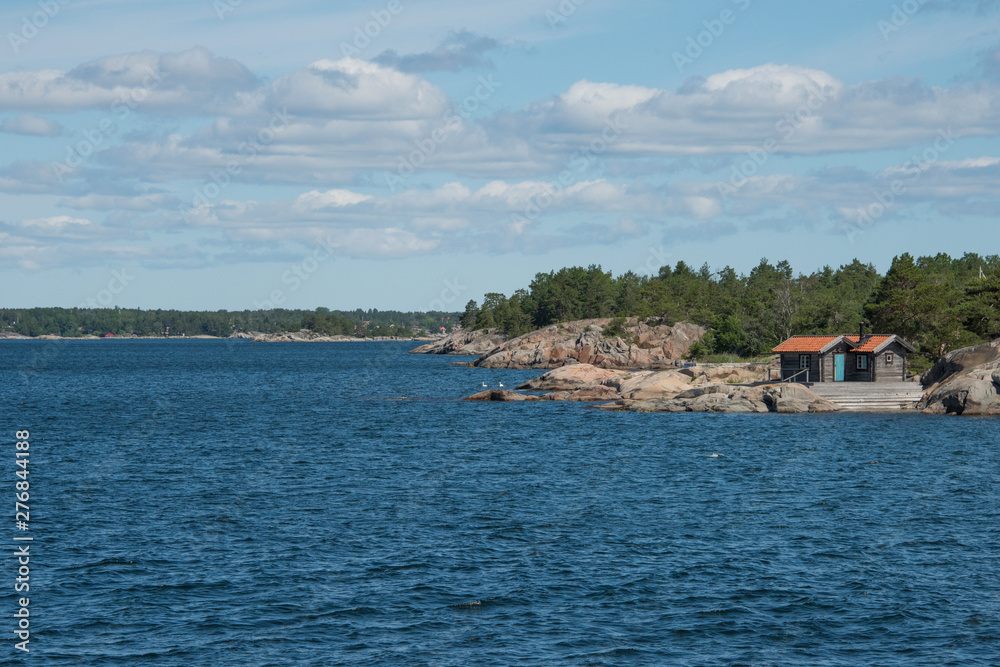  Islands in the Stockholm outer archipelago a sunny sommer day around the bay Bergbofjärden at the island Möja