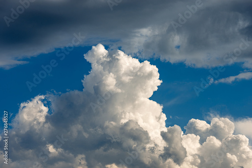 Detail of white clouds in the blue sky - Cumulonimbus
