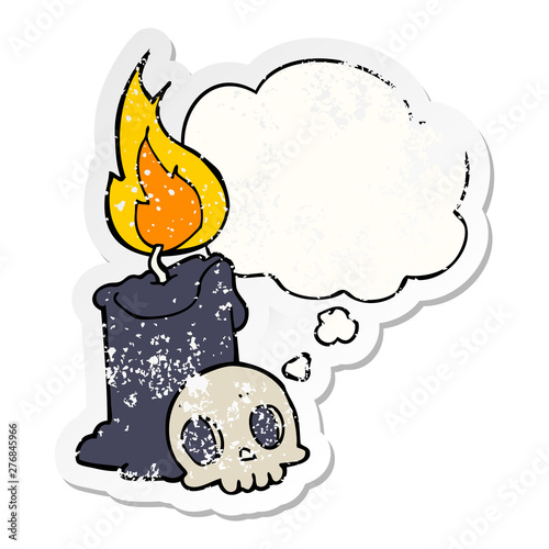 cartoon skull and candle and thought bubble as a distressed worn sticker