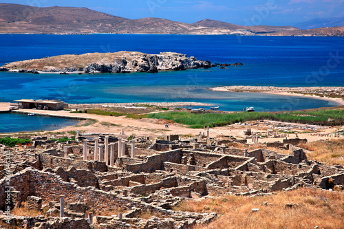  At the archaeological site of the "sacred" island of Delos, Municipality of Mykonos, Cyclades, Greece.. In the background, Rineia island.